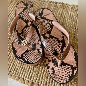 Tory Burch pink python platform thong sandals.